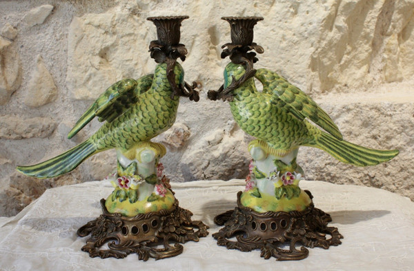 Pair of earthenware parrots forming torches with bronze mounts 20th century