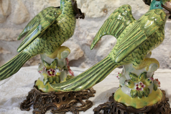 Pair of earthenware parrots forming torches with bronze mounts 20th century