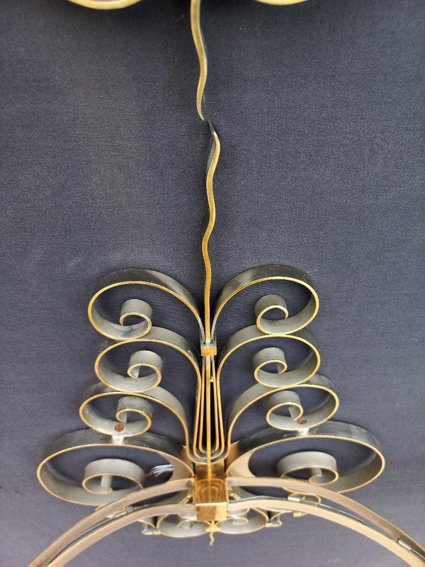 Suite di quattro lampade da parete in ottone dorato, circa 1940