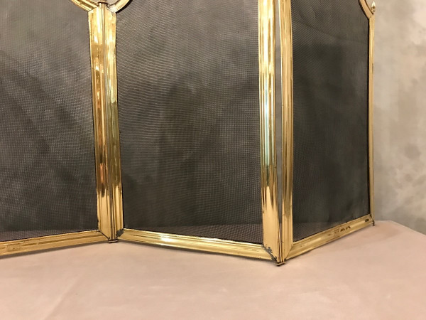 Old fireplace screen in polished brass and varnish from the 19th Louis Philippe period 