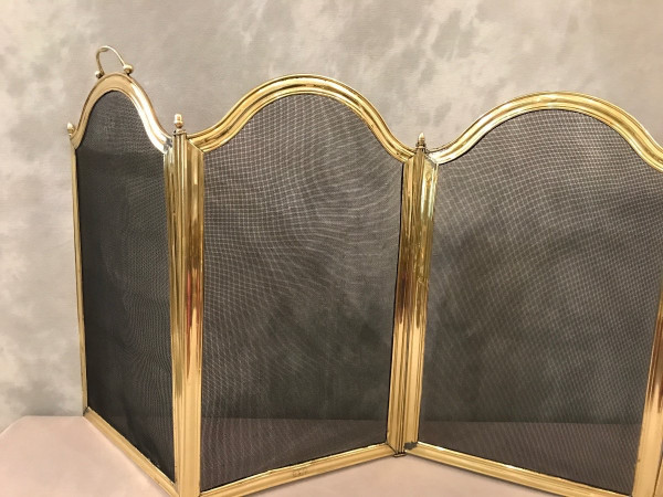 Old fireplace screen in polished brass and varnish from the 19th Louis Philippe period 