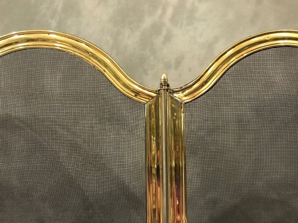 Old fireplace screen in polished brass and varnish from the 19th Louis Philippe period 