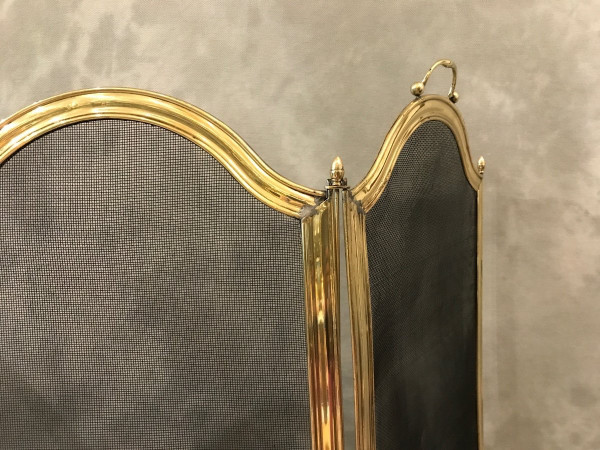 Old fireplace screen in polished brass and varnish from the 19th Louis Philippe period 