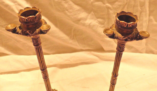 Coppia di candelieri impero in bronzo con piedini ad artiglio di leone