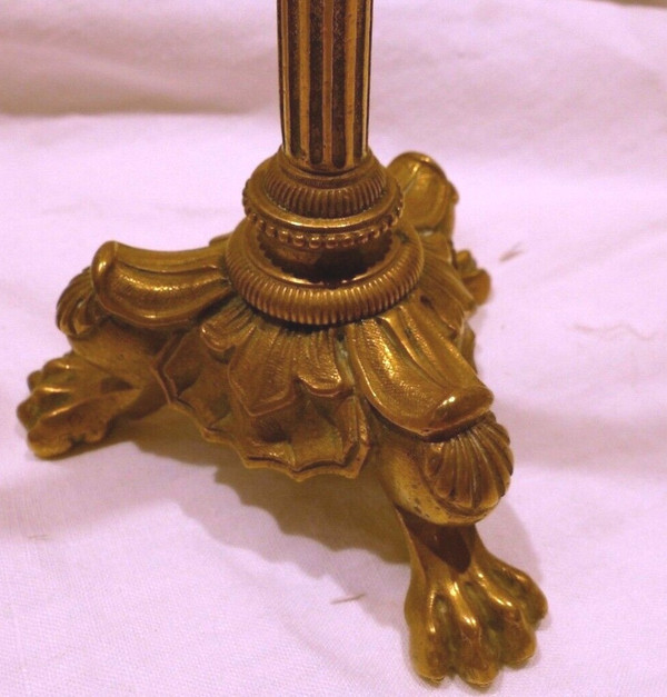 Coppia di candelieri impero in bronzo con piedini ad artiglio di leone