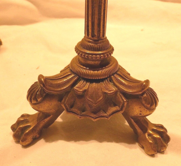 Coppia di candelieri impero in bronzo con piedini ad artiglio di leone