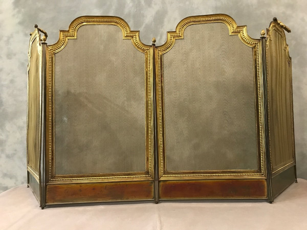 Pare feu de cheminée ancien en laiton doré d'époque 19 ème de style Louis XVI 