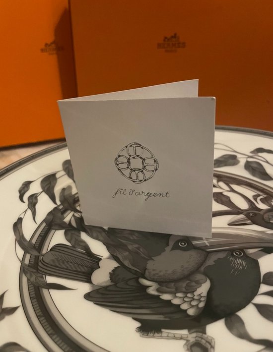 HERMES Paris. "Estampe de Toucans", 6 assiettes en porcelaine en grisaille.