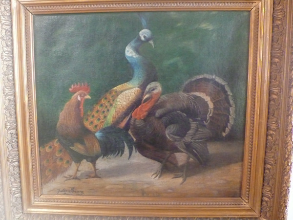 Tableau représentant un paon, un coq et un dindon signé Jules Bracq.