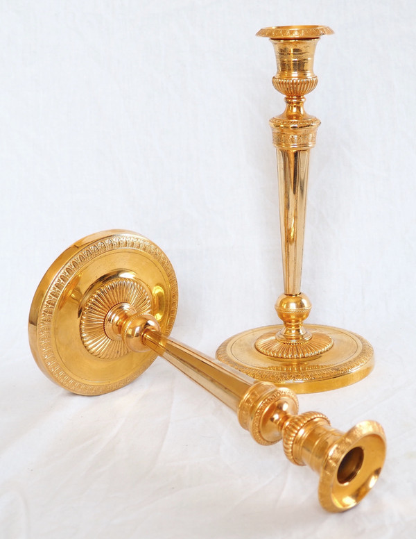 Ravrio - paire de flambeaux d'époque Empire en bronze doré modèle du Château de Fontainebleau