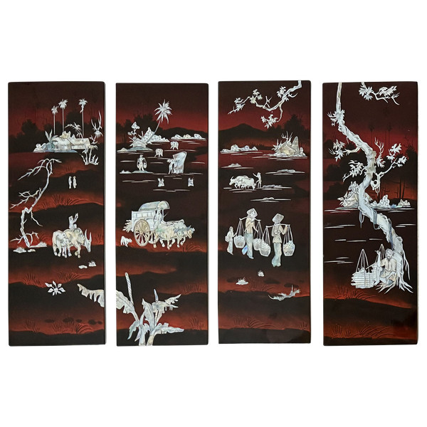 Ensemble de quatre panneaux formant un tableau en laque à décor d'incrustations de nacre