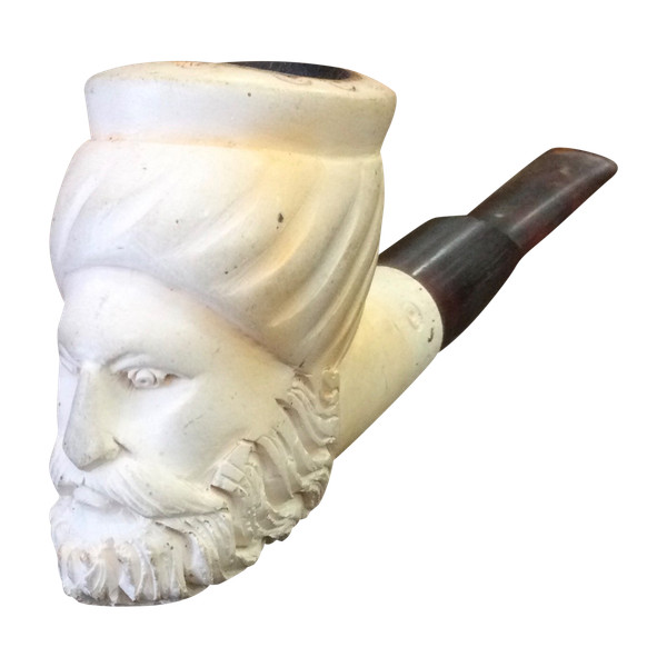 Testa scolpita, pipa 