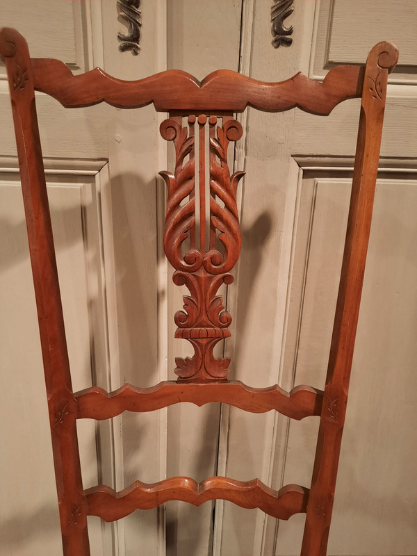 Pair of low cherry changing chairs from the 19th century.