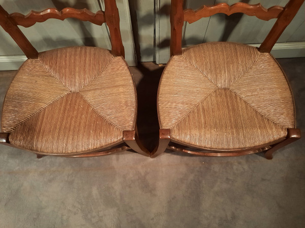 Pair of low cherry changing chairs from the 19th century.