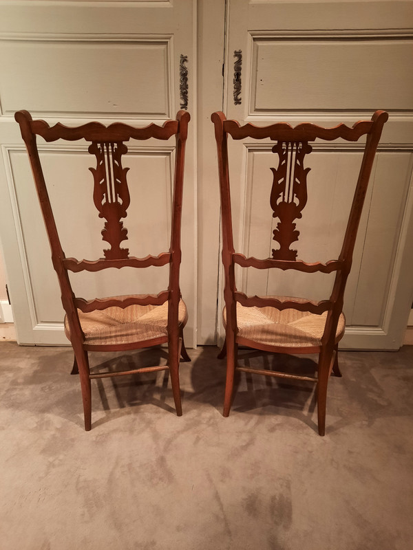 Pair of low cherry changing chairs from the 19th century.