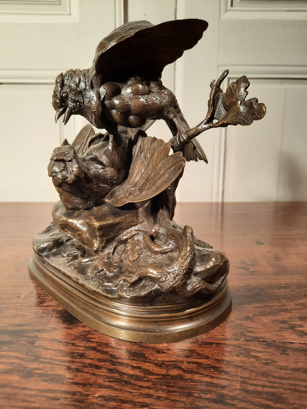 Bronze sculpture representing two birds, signed J. Moigniez from the 19th century.