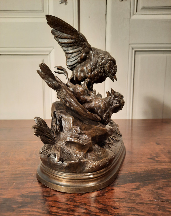 Bronze sculpture representing two birds, signed J. Moigniez from the 19th century.