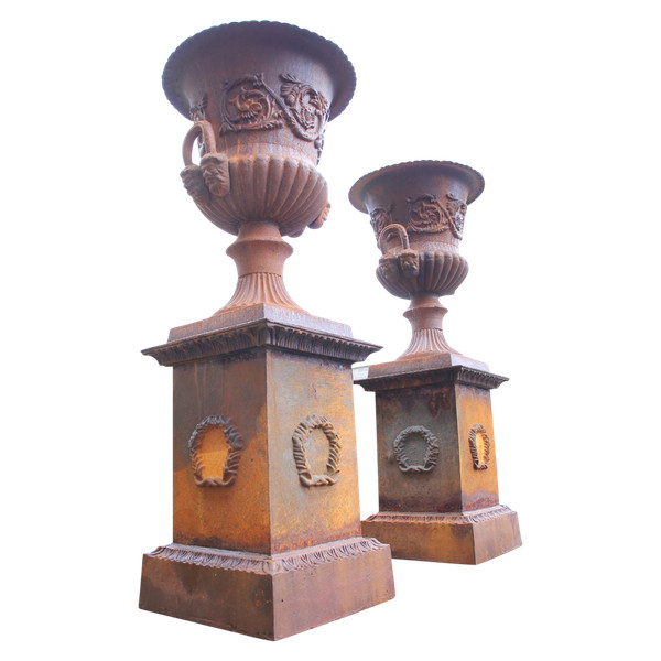 Two Large Medici Vases on their cast iron bases 