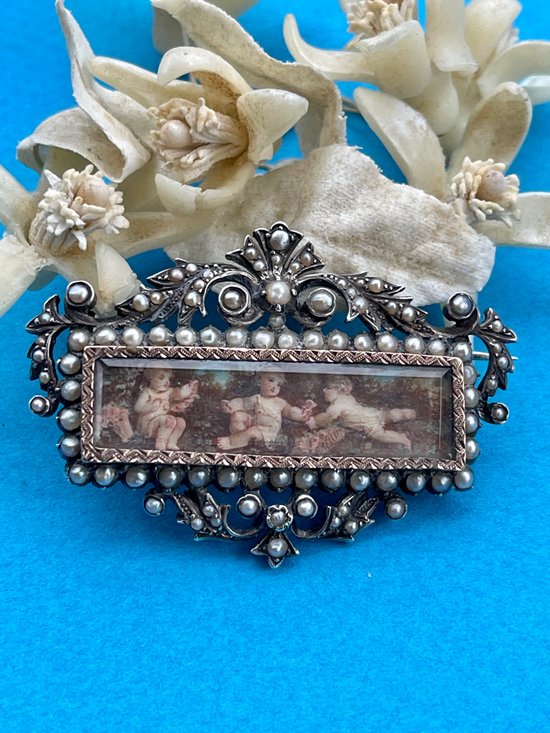 Spilla in argento e oro del XIX secolo.