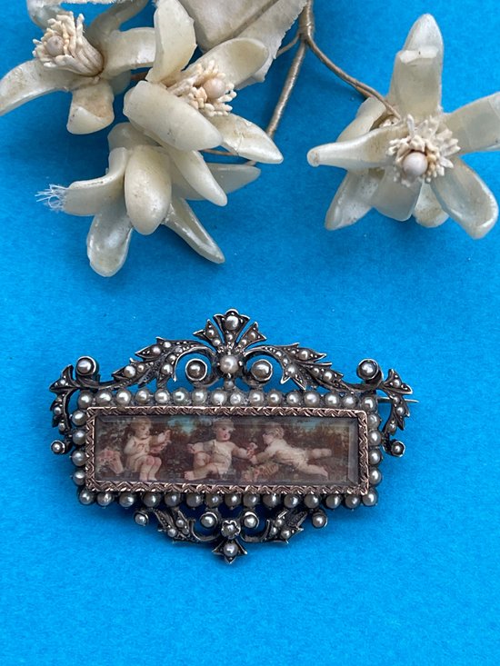 Spilla in argento e oro del XIX secolo.