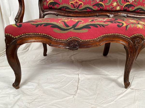 Louis XV-style bench seat upholstered with petit point tapestry, early 19th century