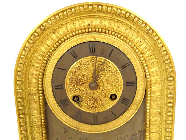 Orologio a palmetta in bronzo dorato Bélisaire Baron Gérard XIX secolo