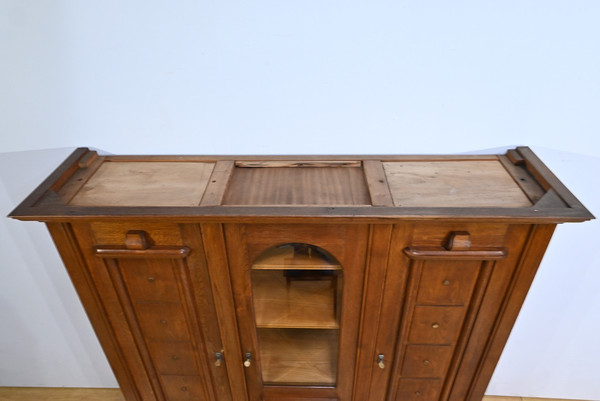 Oak bookcase with three doors