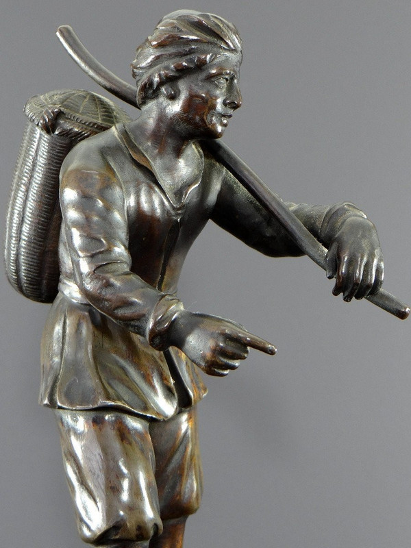 Italy, 18th Century, Bronze Statue Representing a Basket Carrier on a Marble Base.