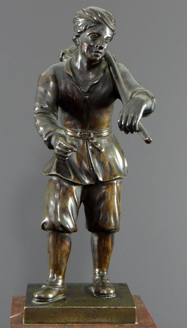 Italy, 18th Century, Bronze Statue Representing a Basket Carrier on a Marble Base.