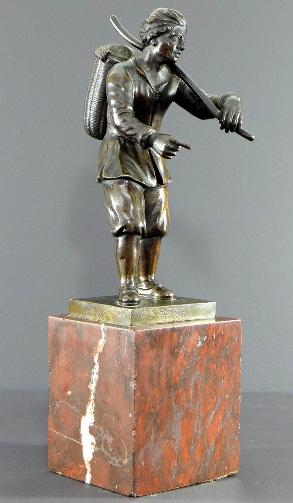 Italy, 18th Century, Bronze Statue Representing a Basket Carrier on a Marble Base.