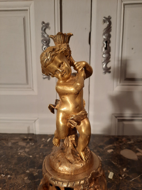 Pair of bronze cherubs in Louis XV style from the 19th century.