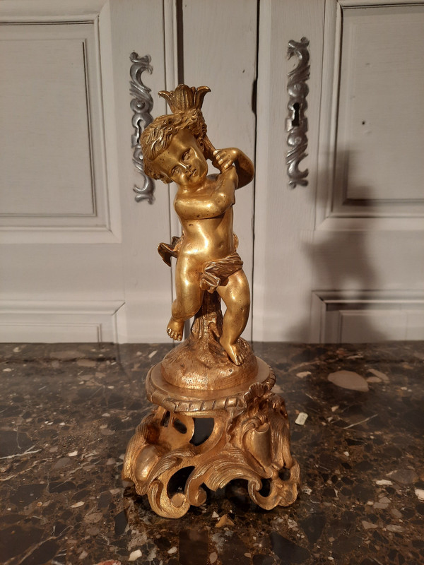 Pair of bronze cherubs in Louis XV style from the 19th century.