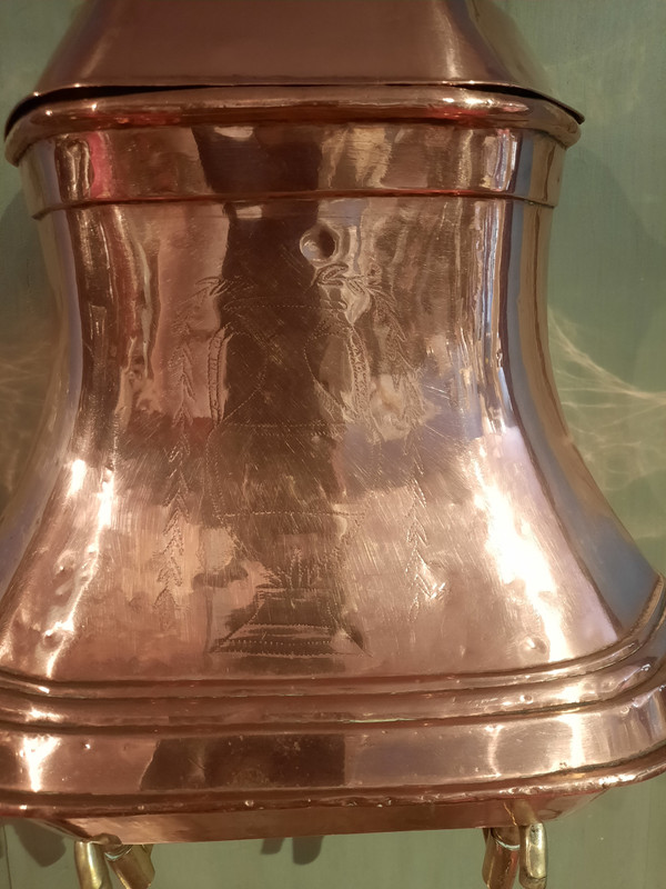 Fountain and its copper basin from the 18th century.