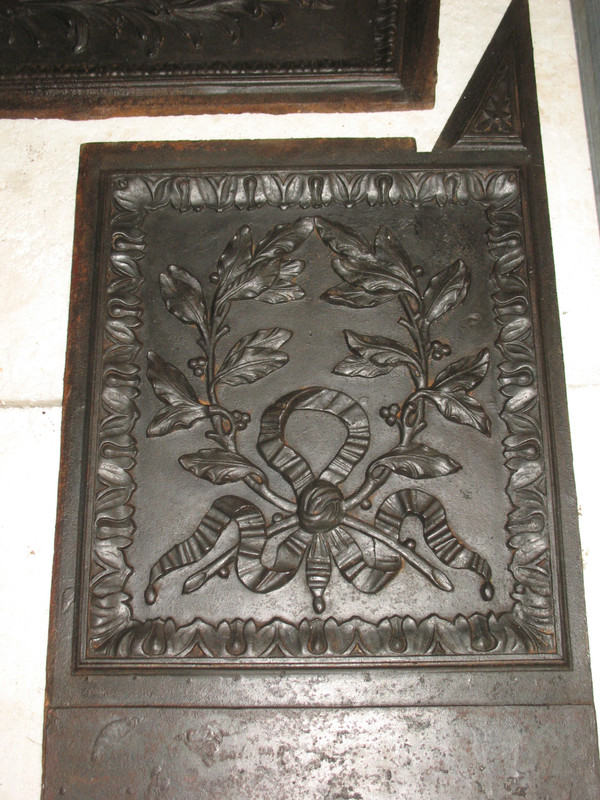 Louis XVI period fireplace in Turquin blue marble complete with its 18th century cast iron hearth 