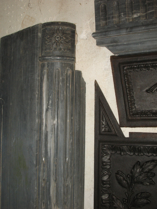 Louis XVI period fireplace in Turquin blue marble complete with its 18th century cast iron hearth 