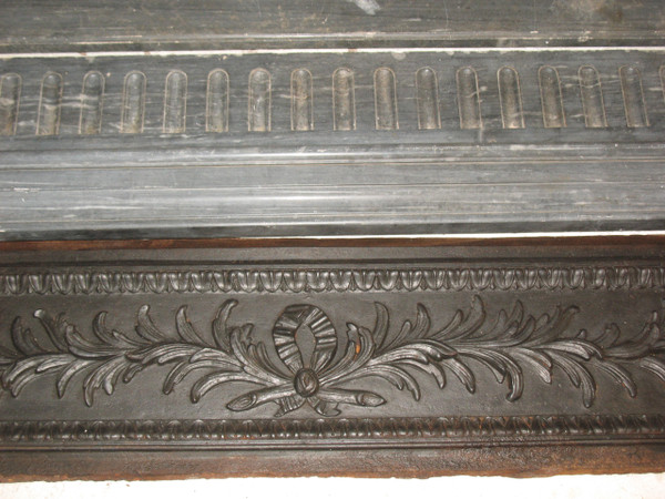 Louis XVI period fireplace in Turquin blue marble complete with its 18th century cast iron hearth 