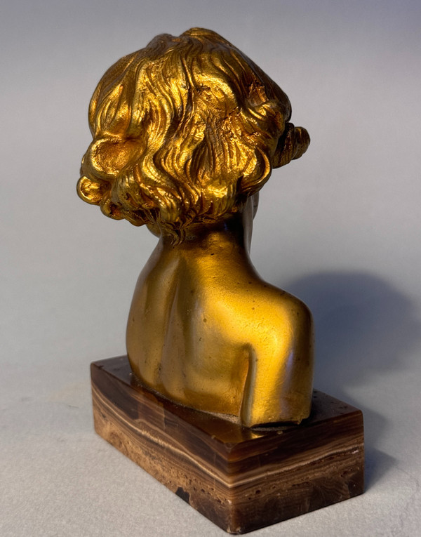 Scultura in bronzo dorato J.-M. CAMUS Busto di bambino