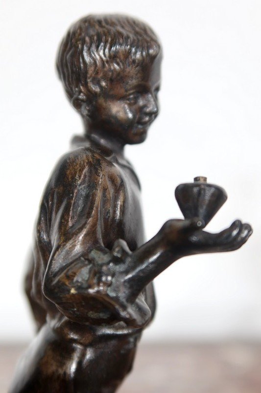  Bronzo "Ragazzo con trottola" - Fine del 19° secolo