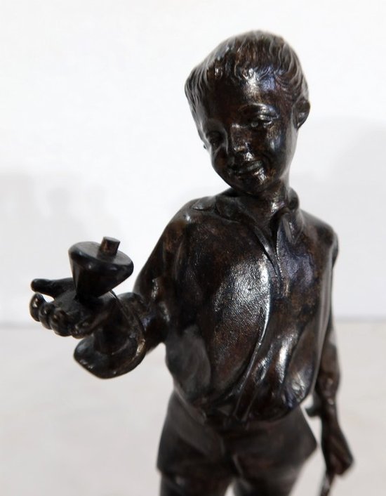  Bronzo "Ragazzo con trottola" - Fine del 19° secolo