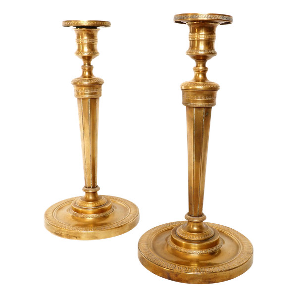 Pair of Empire period gilt bronze candlesticks / torches attributed to Claude Galle
