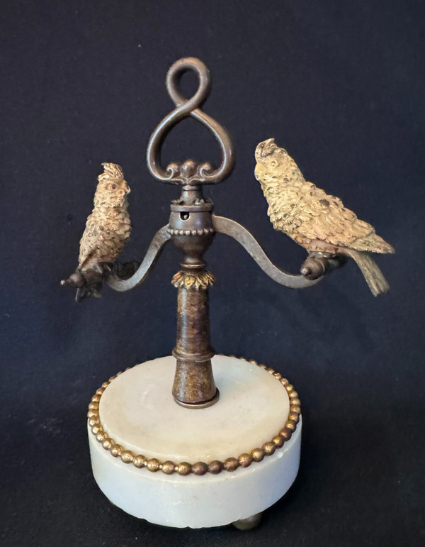 Scultura in bronzo articolata di Vienna "Parrot swing" (cacatua)