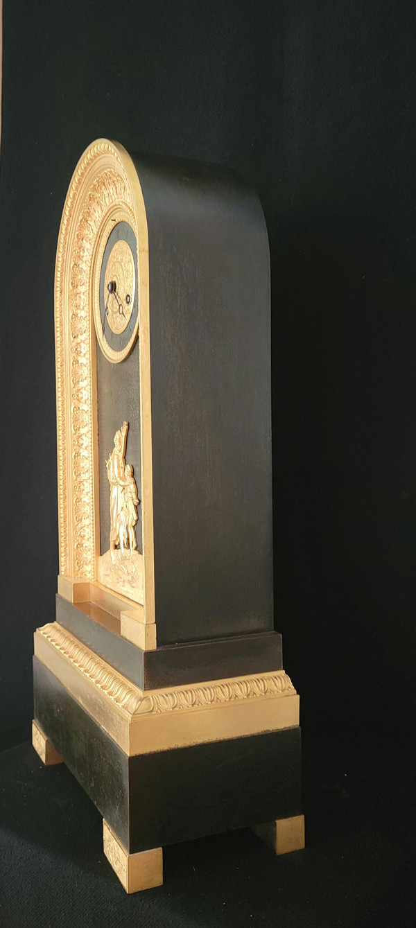large gilt bronze and patinated "HOMERE" clock, Restoration period, 50 cm