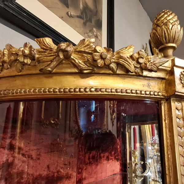 Louis XVI period display case, carved and gilded wood