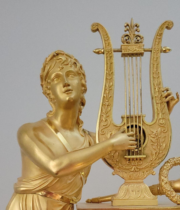 Empire "APOLLON" gilt bronze clock signed Denière et Matelin fabricants de bronzes.
