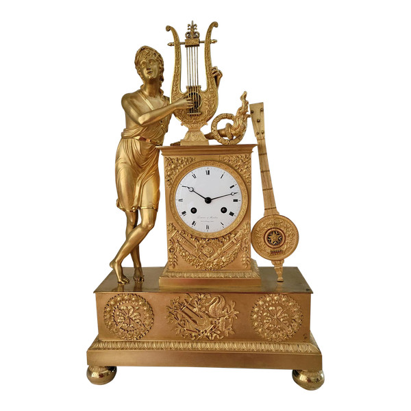 Empire "APOLLON" gilt bronze clock signed Denière et Matelin fabricants de bronzes.