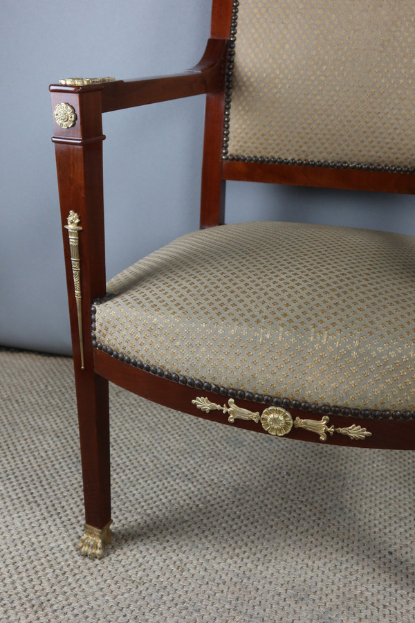 Poltrona Directoire in mogano e bronzo dorato