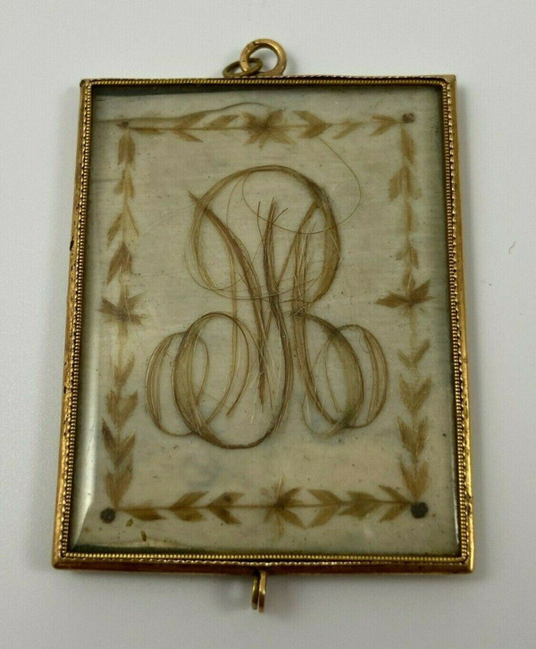 Pendentif en or XIXe travail de cheveux poinçon