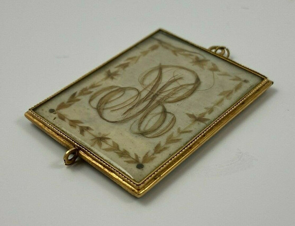 Pendentif en or XIXe travail de cheveux poinçon