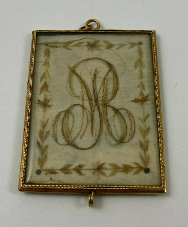 Pendentif en or XIXe travail de cheveux poinçon
