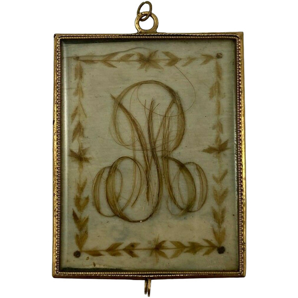 Pendentif en or XIXe travail de cheveux poinçon